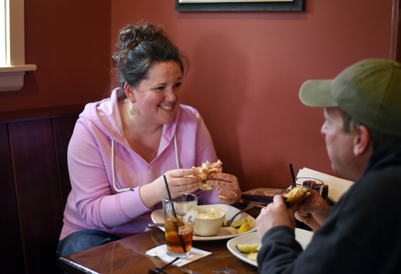 Stephanie and Todd Vincentsen, of Bristol, eat at King Eider's Pub on Monday, April 2. (Jessica Picard photo)