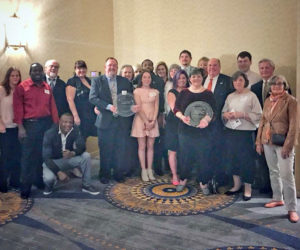 The staff of King Eider's Pub poses for a photo during a ceremony in Portland March 27. The Maine Restaurant Association named the pub's owners the Restaurateurs of the Year. (Photo courtesy Jed Weiss)
