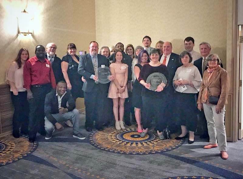 The staff of King Eider's Pub poses for a photo during a ceremony in Portland March 27. The Maine Restaurant Association named the pub's owners the Restaurateurs of the Year. (Photo courtesy Jed Weiss)