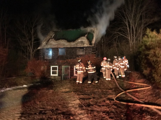 Area firefighters on the scene of a structure fire on Upper Round Pond Road in Bristol the evening of Sunday, April 15. (J.W. Oliver photo)