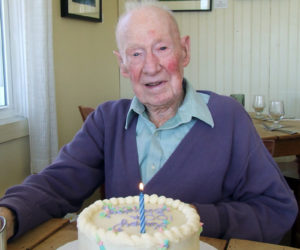 Arthur Jones, of Nobleboro, with his 100th birthday cake. (Photo courtesy Craig Masse)