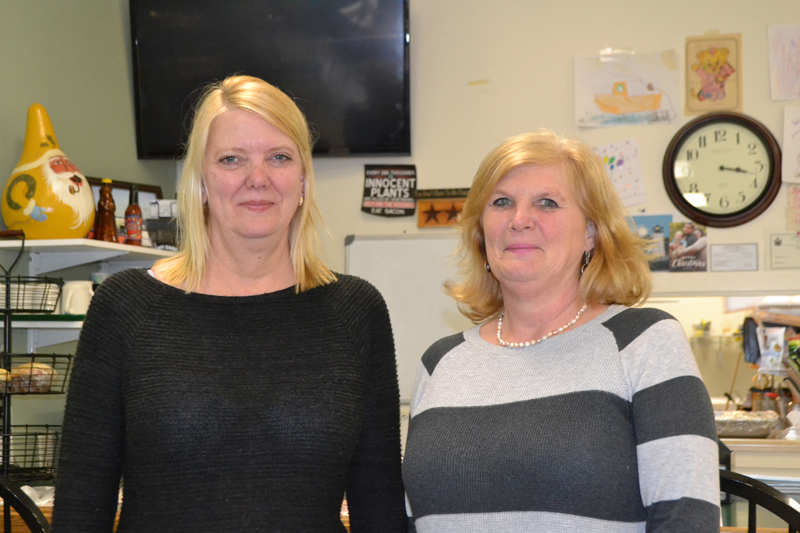 Marketplace Cafe owner Cindy Bradford (left) will soon sell the Wiscasset restaurant to employee Kelley Churchill and go to work for Churchill, her longtime co-worker and friend. (Charlotte Boynton photo)