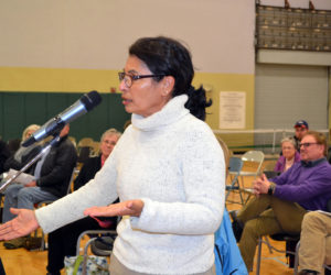 Wiscasset resident Claudia Sortwell speaks during a public hearing about the town's upcoming referendum to determine if it will continue a lawsuit against the Maine Department of Transportation. (Charlotte Boynton photo)