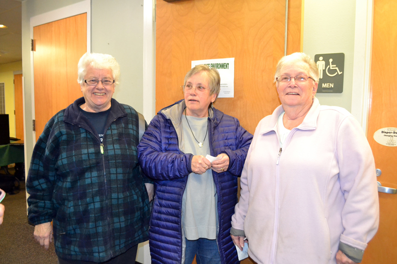 From left: Wiscasset Selectman Katharine Martin-Savage, former Selectman Judy Flanagan, and Selectman Judy Colby discuss the need for the town to move forward after the referendum Tuesday, April 17. (Charlotte Boynton photo)