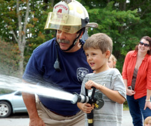 The late Michael "Captain Newman" Santos authored "The Hose Line" column to educate the public on fire safety and related issues.