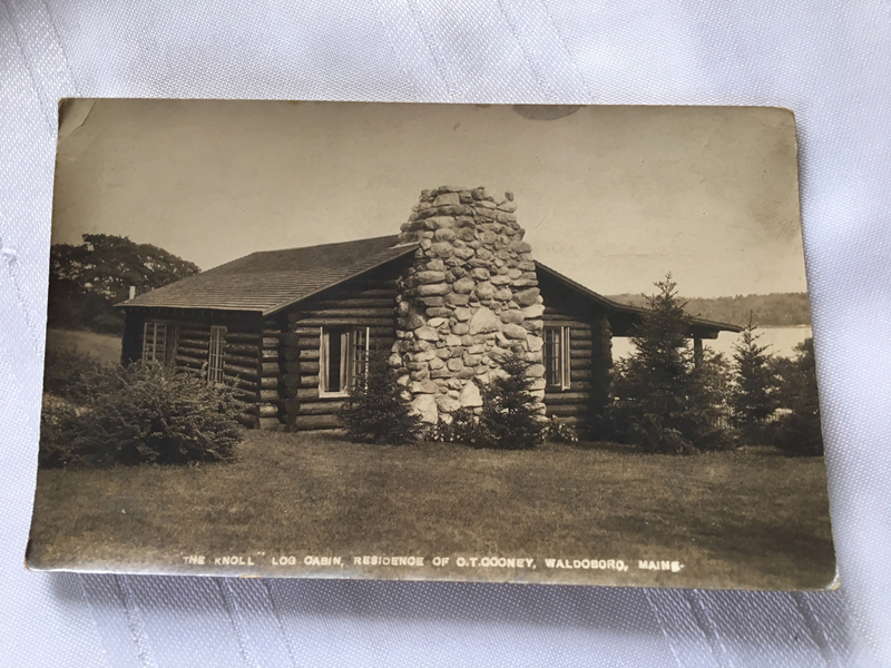 A photograph featuring the outside view of O.T. CooneyÂ’s original cabin, The Knoll.