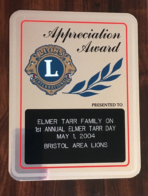 The award presented to the Elmer Tarr family by the Bristol Area Lions Cllub.