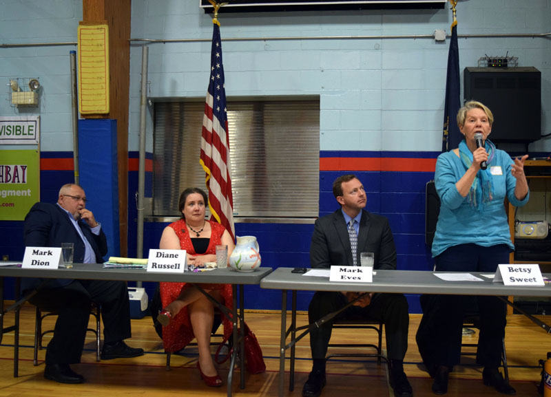 From left: state Sen. Mark Dion, Diane Russell, and Mark Eves listen to Betsy Sweet during a gubernatorial candidates forum at Great Salt Bay Community School in Damariscotta on Saturday, May 12. (J.W. Oliver photo)