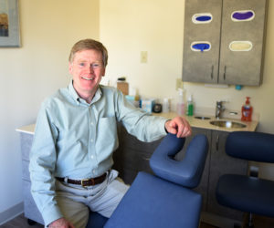 Dr. Thomas Rice sits in the new Damariscotta location of his practice, Midcoast Orthodontics, Friday, May 18. (Jessica Picard photo)