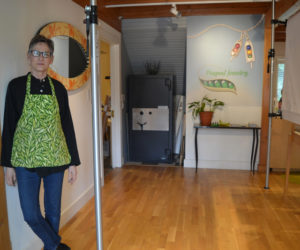 Ronna Lugosch stands in the future doorway of the new extension of the current jewelry-making studio at Peapod Jewelry in Edgecomb. (Christine LaPado-Breglia photo)