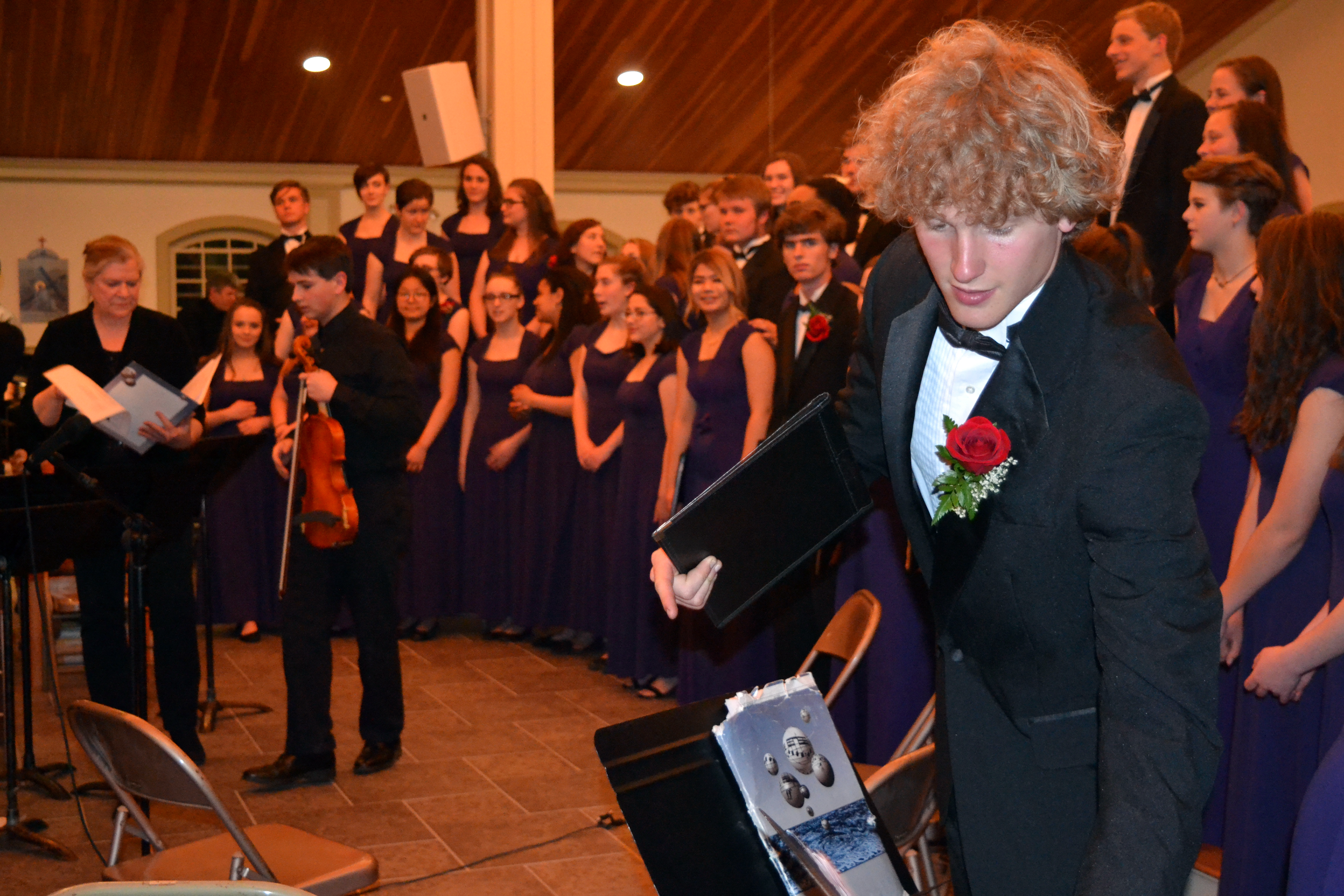 Lincoln Academy choir and string orchestra members, with orchestra director Carol Preston (left), get ready to pose for photographs at the end of the LA Spring Concert on Sunday, May 20. (Christine LaPado-Breglia photo)