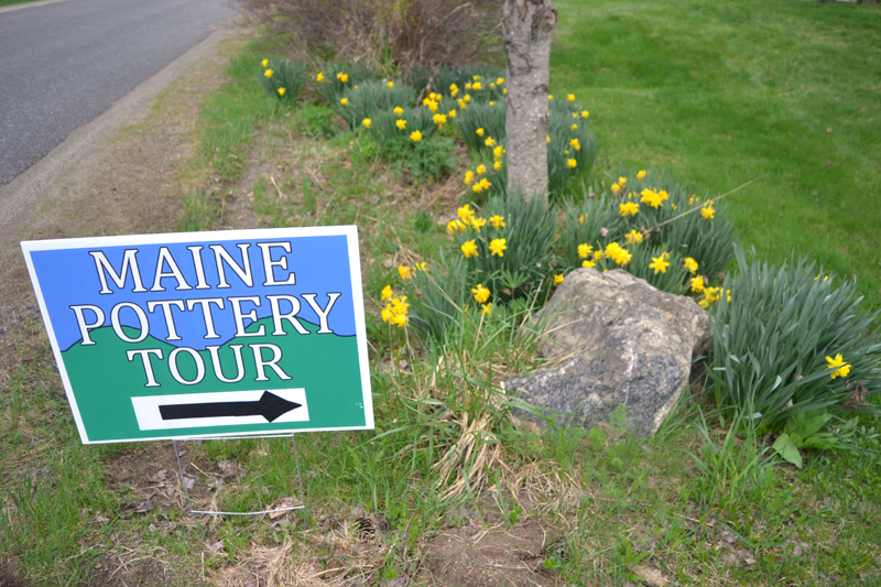 The sign and the daffodils outside Whitefield Pottery welcome visitors during the Maine Pottery Tour, Saturday and Sunday, May 5 and 6. (Christine LaPado-Breglia photo)