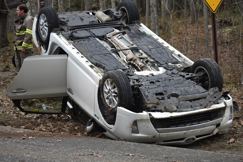 A Toyota Prius lies on its roof after a two-vehicle collision in North Nobleboro the afternoon of Sunday, May 6. (Alexander Violo photo)