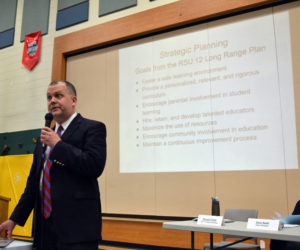 RSU 12 Superintendent Howard Tuttle presents the district's budget during the budget-adoption meeting at Chelsea Elementary School on Thursday, May 17. (Jessica Clifford photo)