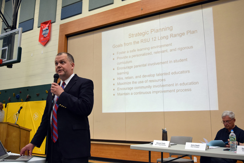 RSU 12 Superintendent Howard Tuttle presents the district's budget during the budget-adoption meeting at Chelsea Elementary School on Thursday, May 17. (Jessica Clifford photo)