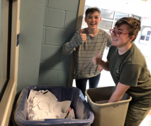 Having fun recycling.