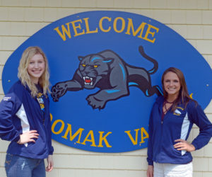 Medomak Valley cheerleaders Megan Wright and Adrianna Wadsworth have cheered together for five years. They are heading off to rival Division I schools to cheer in the fall. Wright will attend the University of New Hampshire and Wadsworth the University of Maine. (Paula Roberts photo)