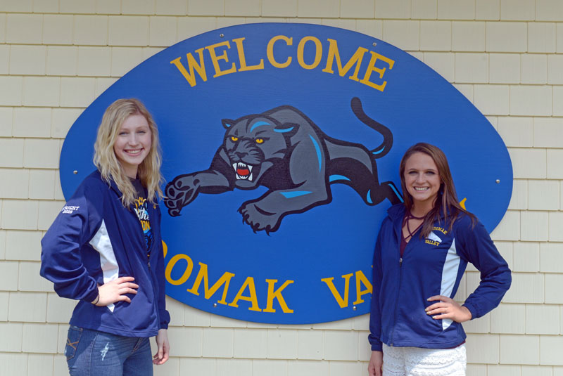 Medomak Valley cheerleaders Megan Wright and Adrianna Wadsworth have cheered together for five years. They are heading off to rival Division I schools to cheer in the fall. Wright will attend the University of New Hampshire and Wadsworth the University of Maine. (Paula Roberts photo)