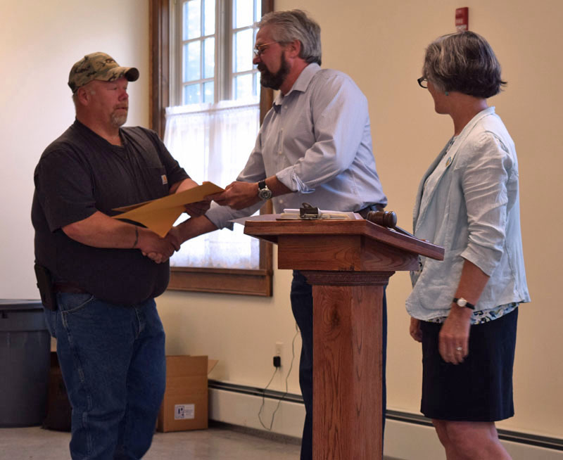 From left: Dresden Fire Chief Steven Lilly, on behalf of Dresden Fire and Rescue, accepts the Spirit of America Award for outstanding community service from state Rep. Jeffrey Pierce and state Sen. Eloise Vitelli. (Jessica Clifford photo)
