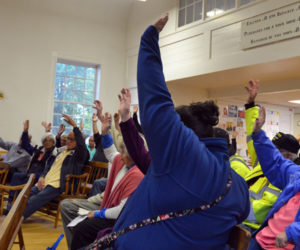 Edgecomb residents vote to buy a new fire truck during a special town meeting at the town hall Monday, June 4. (Maia Zewert photo)