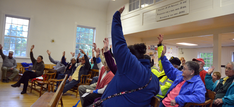 Edgecomb residents vote to buy a new fire truck during a special town meeting at the town hall Monday, June 4. (Maia Zewert photo)