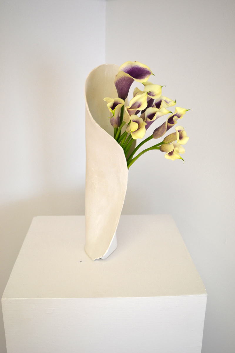 One of Stephanie Wright's hand-built stoneware vases, with calla lilies. (Christine LaPado-Breglia photo)