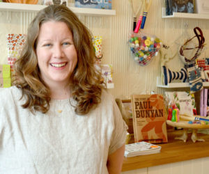 The Beach Plum Co. owner Amanda "A.J." Kras stands in her new brick-and-mortar store at 77 Main St. in Newcastle. (Maia Zewert photo)