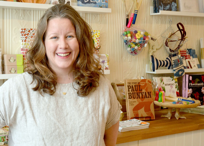 The Beach Plum Co. owner Amanda "A.J." Kras stands in her new brick-and-mortar store at 77 Main St. in Newcastle. (Maia Zewert photo)
