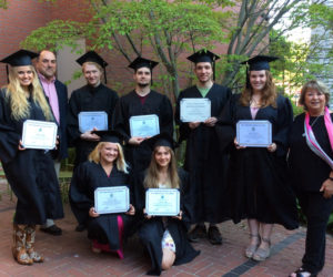 Central Lincoln County Adult Education 2017-2018 graduates: (standing from left) Rachel Nichols, Matthew Wells, Austin Gordon, Farris Allen, and Brittany Sprague; and (kneeling from left) Kelsey Walker and Rose Lincoln. Also pictured are CLC Adult Education Director Pamela Sperry (far right) and interim AOS 93 School Superintendent Jim Hodgkins (standing second from left).