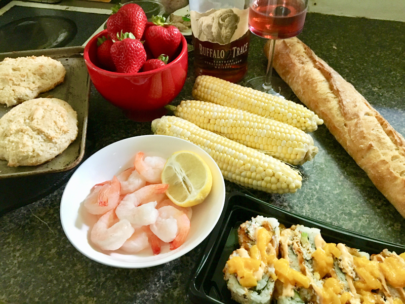 Mise en place for sauteed shrimp with lemon, mango sushi, crusty French bread, corn on the cob, and strawberry shortcake. Oh - and a Manhattan (duh). (Suzi Thayer photo)