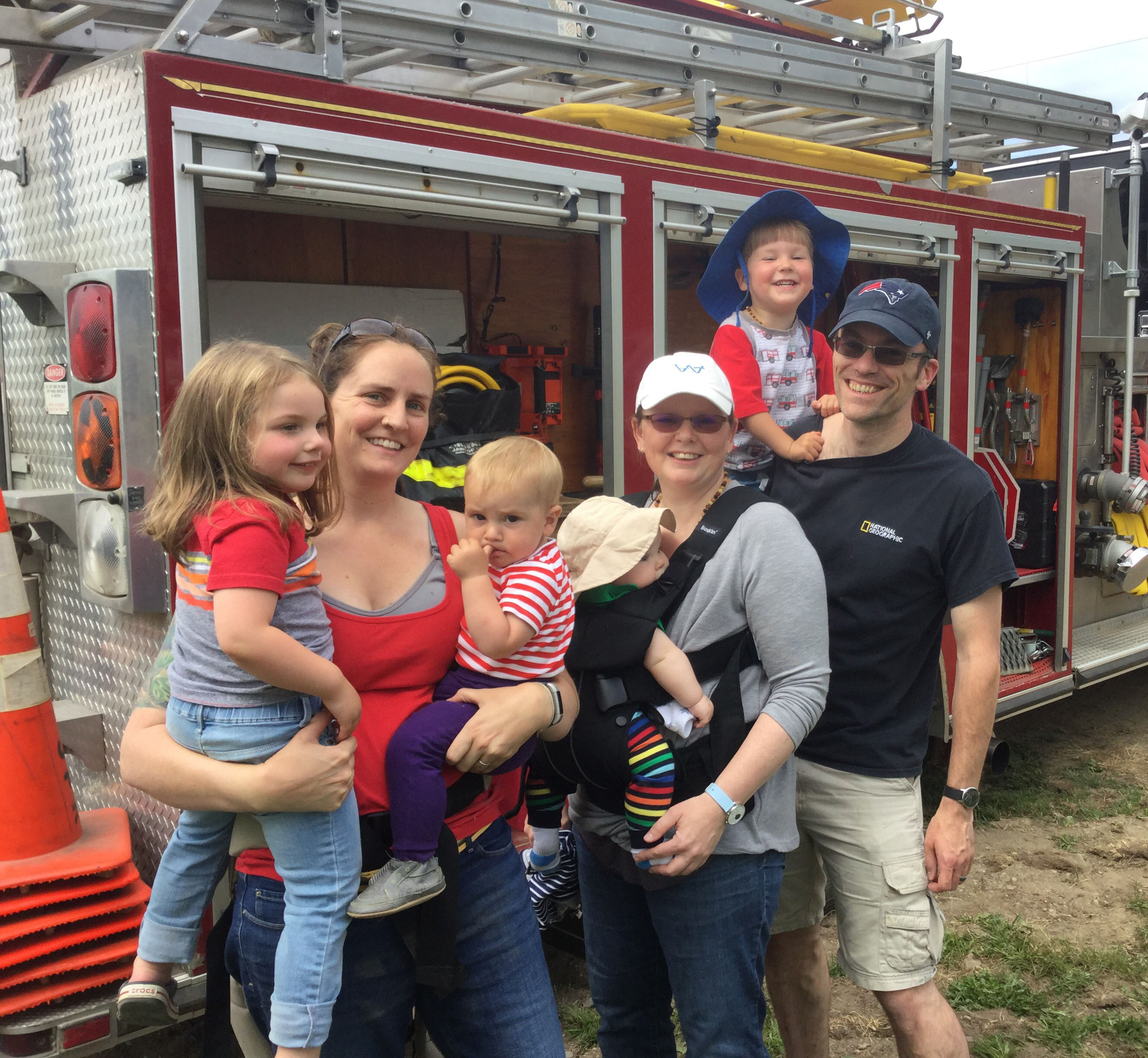 Familes explore a fire truck during the Jefferson Scoop fundraiser for Jefferson Fire and Rescue on Saturday, June 23. (Photo courtesy Joe Holland)