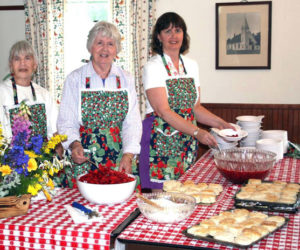 From left: Betty Forsberg, Gladys Johnston, and Laurie Bouchard at a previous Strawberry Festival.