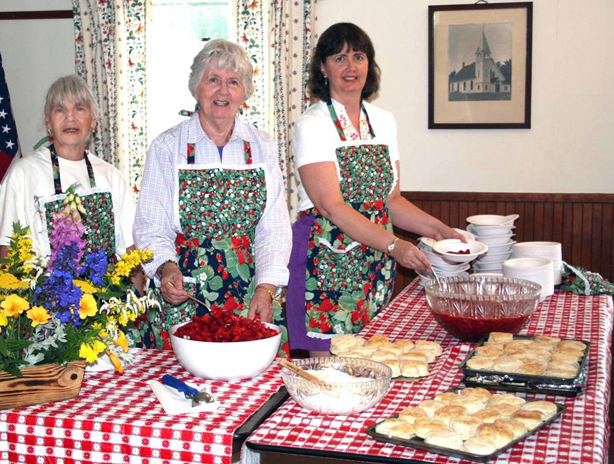 From left: Betty Forsberg, Gladys Johnston, and Laurie Bouchard at a previous Strawberry Festival.