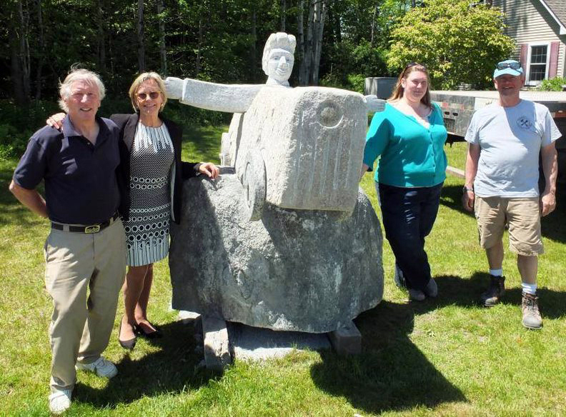 From left: Bill Royall, Patricia Royall, Margaret Hoffman, and Dick Alden with Bill Royall's sculpture, "Soapbox Racer." (Photo courtesy Patricia Royall)