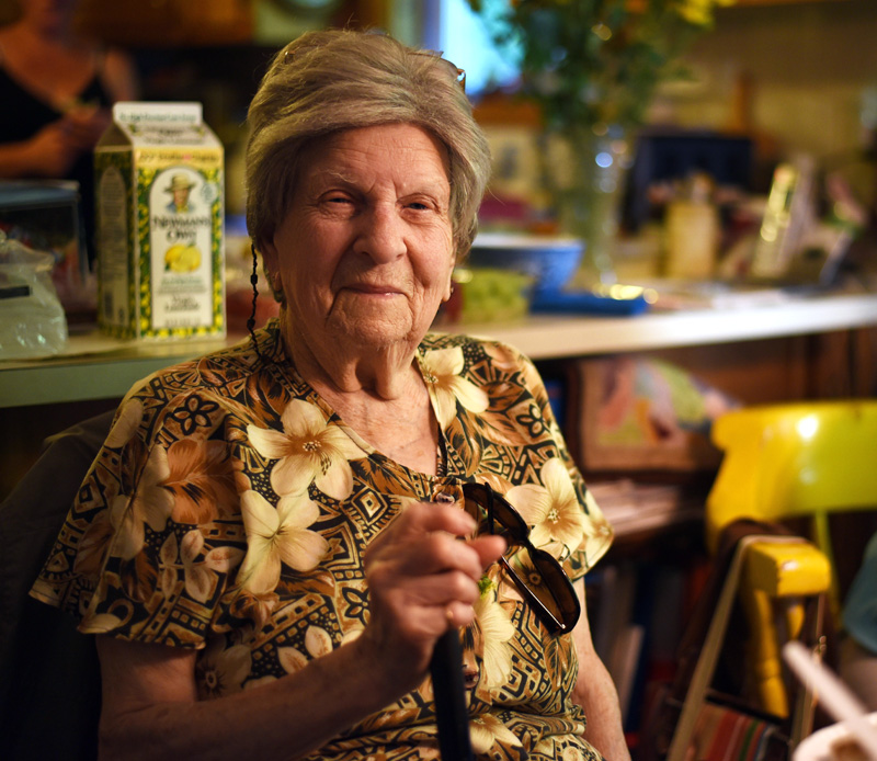 Georgina Rayburn poses with Bristol's Boston Post Cane in her home Friday, July 20. (Jessica Picard photo)