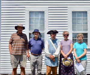 From left: Daniel Mocarski, David Brydges, Don Loprieno, Claire Mocarski, and Pat Kay make up the Voices of the Past for the reading of the Declaration of Independence at the Colonial Pemaquid State Historic Site. (Johanna Neeson photo)