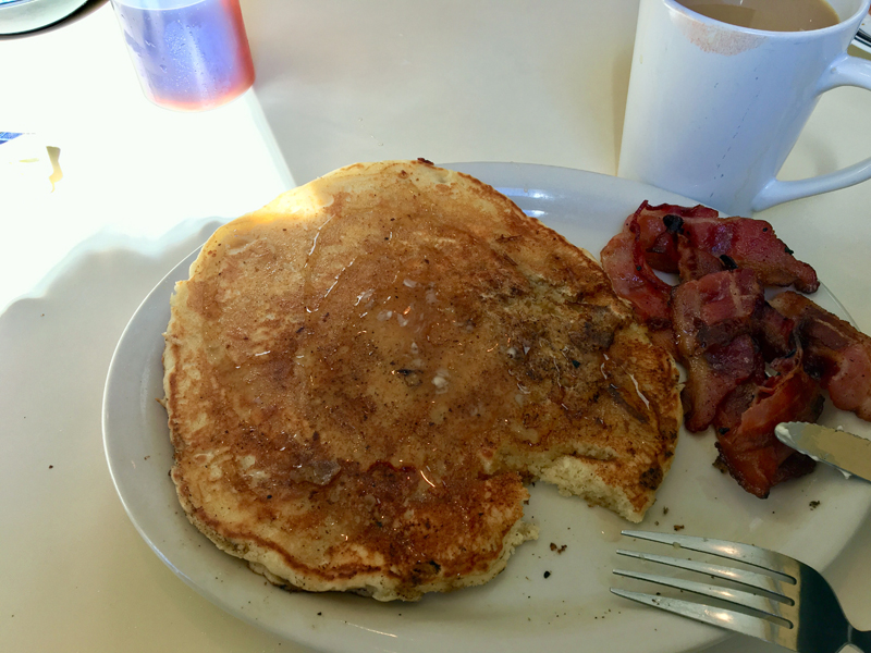 Bigger-than-your-head pancakes and perfectly cooked bacon are on the new breakfast menu at The Penalty Box. (Suzi Thayer photo)