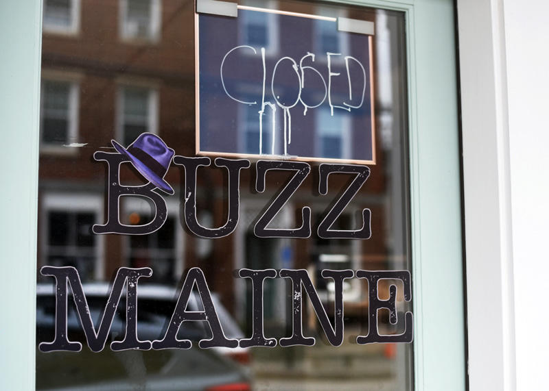 A closed sign on the door of Buzz Maine, at 133 Main St. in Damariscotta. The business closed Saturday, June 30, with the owner telling members she plans to reopen elsewhere next year. (Jessica Picard photo)