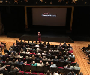 Eliot Daley addresses the audience at Lincoln Theater on the evening of Friday, July 27. (Photo courtesy Andrew Fenniman)