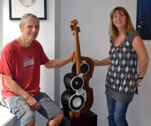 Philippe and Jacqueline Guillerm with one of Philippe Guillerm's cello-shaped "sculptural speakers." (Christine LaPado-Breglia photo)