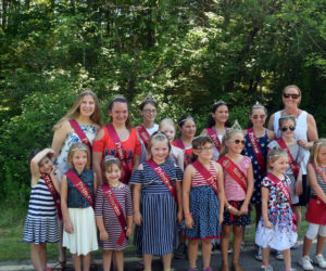 The Pittston Fair Maine Strawberry Pageant participants, with Pageant Director Liz Chaisson (back right), pose for a photo before walking in the Whitefield Fourth of July parade. (Jessica Clifford photo)