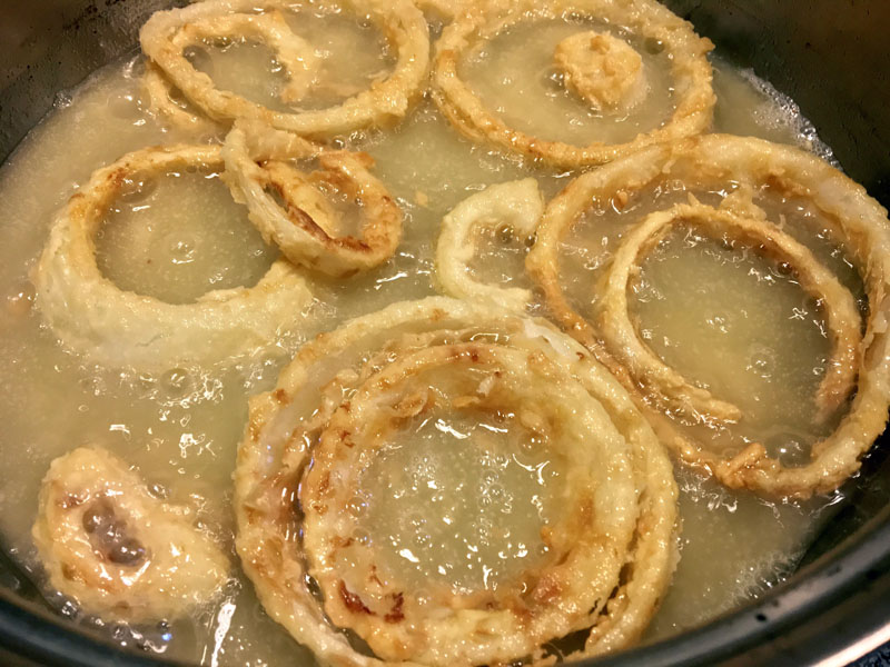 Sip a Manhattan while watching onion rings turn golden brown. (Suzi Thayer photo)