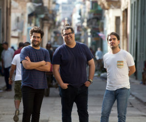 The Lopez-Nussa brothers flank Gaston Joya.