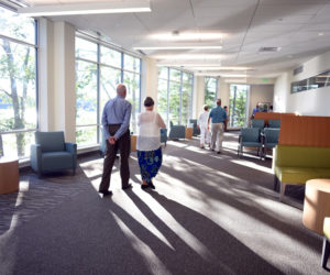 Guests walk through one of the waiting rooms in the new Herbert and Roberta Watson Health Center on LincolnHealth's Miles Campus in Damariscotta, Friday, Aug. 10. (Jessica Picard photo)