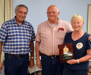 From left: Lincoln County Fire Chiefs Association Vice President Roger Whitney and Bristol Fire Chief Paul Leeman Jr. present the association's Officer of the Year Award to Jeri Pendleton, longtime leader of the Bristol First Responders.