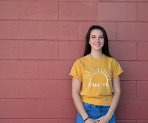 Margaret Skiff, founder of the Sunrise Clothing Co. online store, models one of her T-shirts. (Johanna Neeson photo)