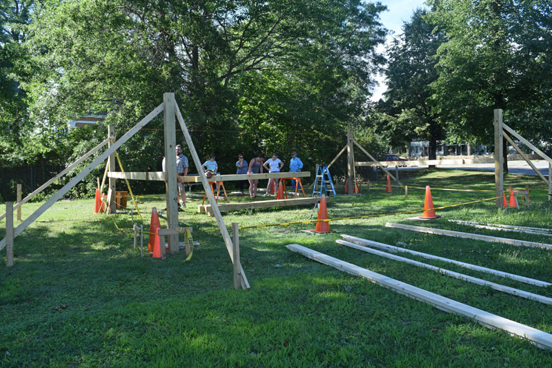 Volunteers work on a pavilion-style outdoor classroom at Wiscasset Elementary School. (Jessica Clifford photo)