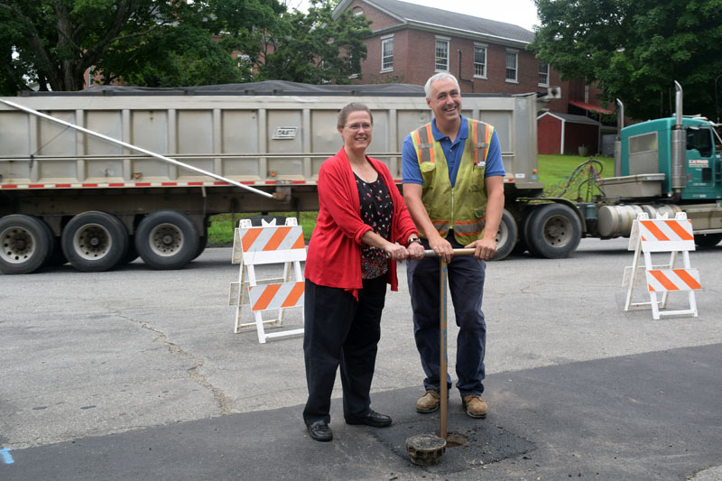 Lincoln County Administrator Carrie Kipfer and Wiscasset Water District Superintendent Chris Cossette pose for a photo during a valve-turning ceremony for the district's infrastructure project Monday, Aug. 13. (Jessica Clifford photo)