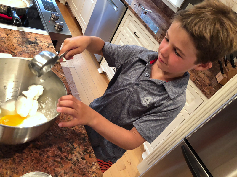 Lise's grandson, Adam, helps her make gobs. (Photo courtesy Lise Roy)