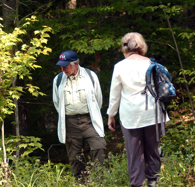 Marc Brodsky (left) and Valerie Lownes examine foliage. (Joelle Troiano photo)